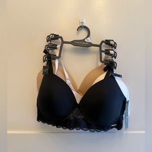 NWT three TAHARI size 36C lace trimmed padded wire free bras. Two clasp closure.